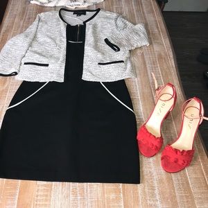 Beautiful black dress with white piping